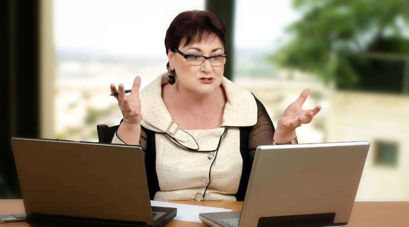 Frustrated Mature Female with laptop